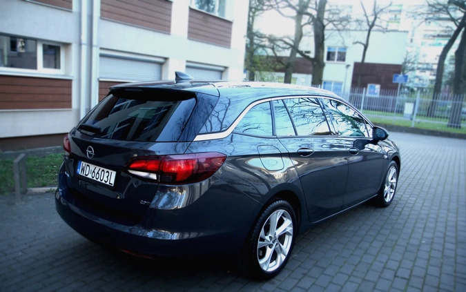 Opel Astra cena 43000 przebieg: 125800, rok produkcji 2016 z Legionowo małe 67